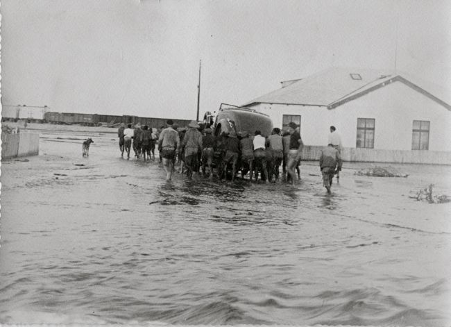 When the Swakop River was flooded in 1934 the railway line to Windhoek was washed away and new cars arriving from the United States had to be manhandl