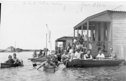 Floods in Walvis Bay, 1934. People in boats on what was streets