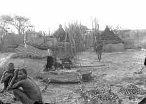 People in a village in a traditional house